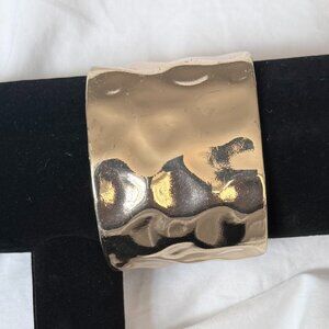 Gold tone metal bracelet